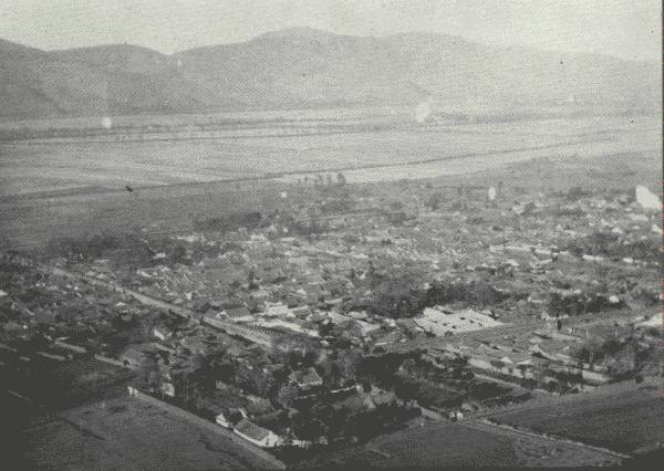 BEAUTIFUL TONG-CH'UANFU IN Y&Uuml;N-NAN

The city in which the Author rested for several months when his right
arm was broken; situated between two high ranges, Tongch'uanfu Valley is
extremely beautiful.