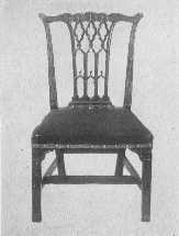 Two important phases of Chippendale's work&mdash;an elaborate
ribbon-back chair, and one of the more staid Gothic type.