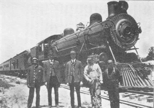 With Wm. Blood, My Old Cowboy Friend, and Other Friends
at the Close of My Railroad Career