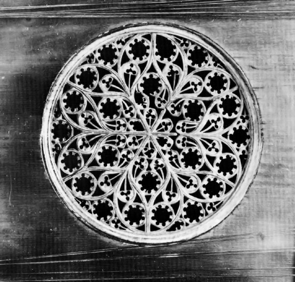 Figure 12.&mdash;Typical decorative device, known as rose,
that appeared in soundboards of virginals and harpsichords.