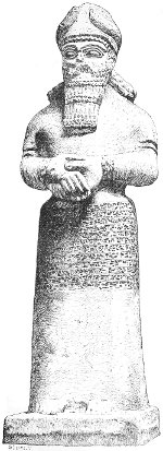 Fig. 15.&mdash;Statue of Nebo; from Nimroud. British Museum.
Calcareous stone. Height 6 feet 5 inches.