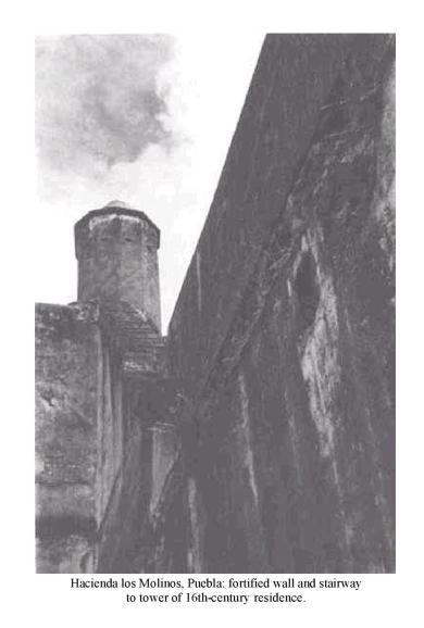 Hacienda los Molinos, Puebla: fortified wall and stairway to tower of 16th-century residence.